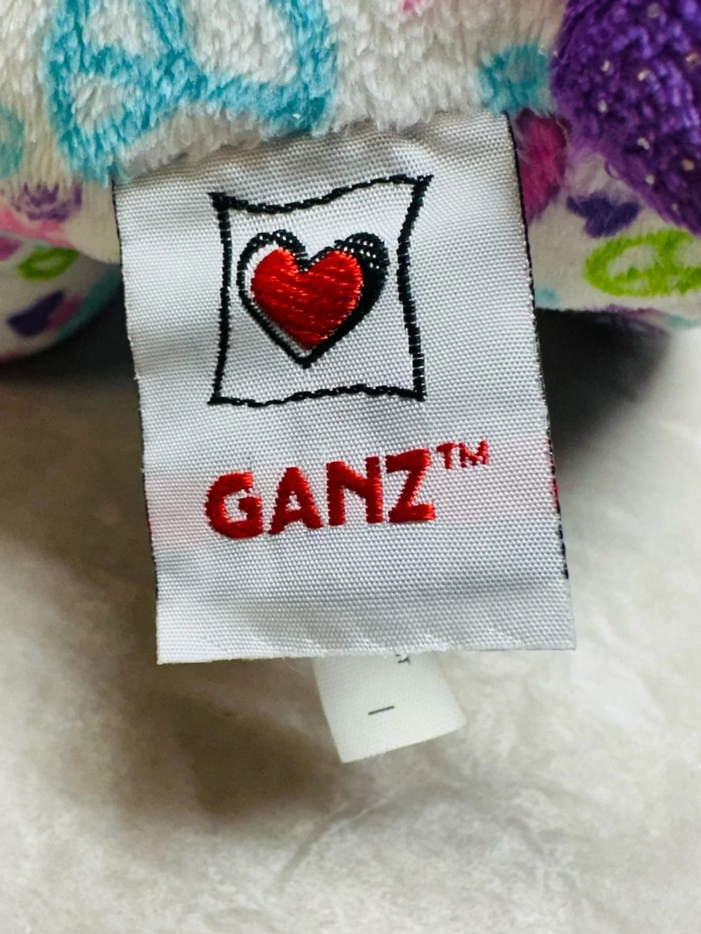 WEBKINZ GANZ Plush Puppy Toy - Purple & Multicolor Peace Signs